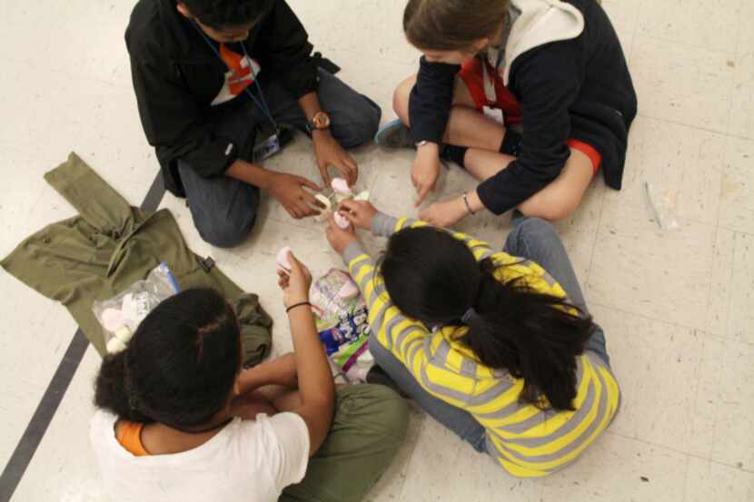 Students work in groups in a recent activity of the Zero Hour class at Westwood Junior High....