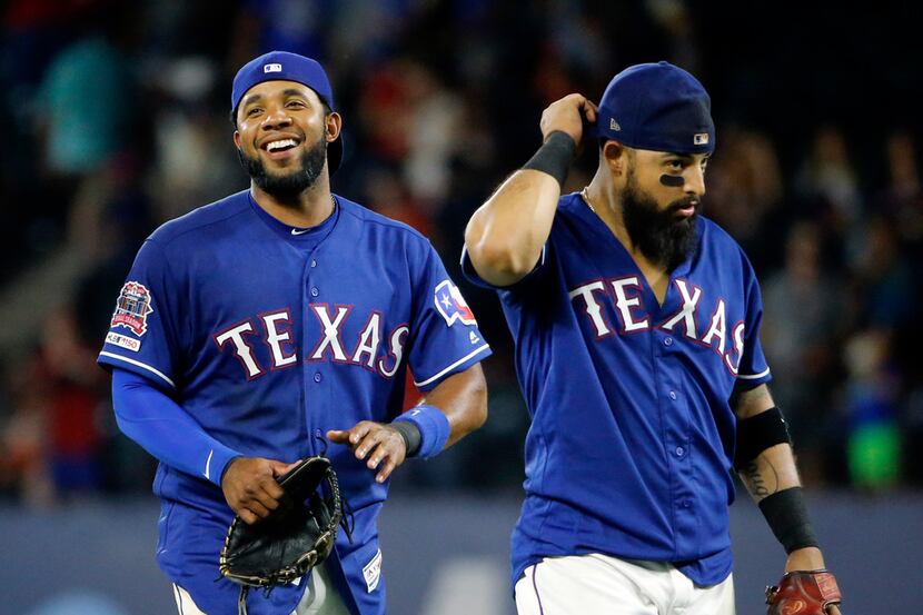 Texas Rangers shortstop Elvis Andrus (left) and second baseman Rougned Odor (right) are...