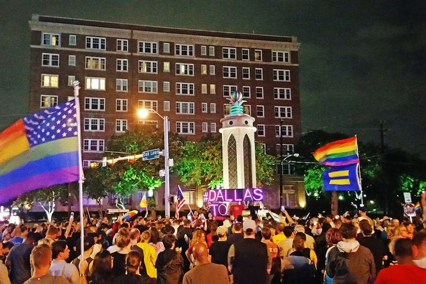 North Texas' LGBT community rallies in front of the Legacy of Love Monument in Oak Lawn,...