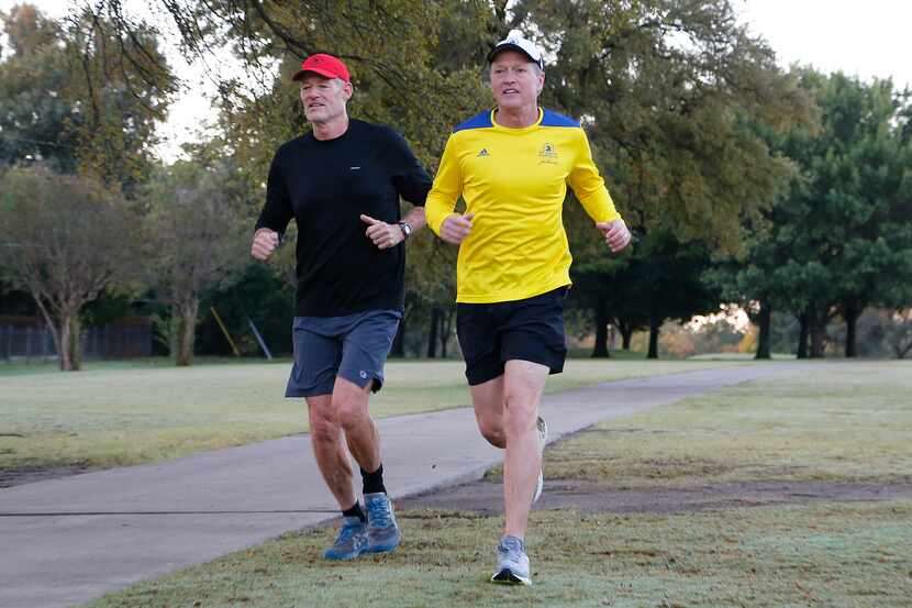 Ken Ord (left) and Mark Denny run together at Canyon Creek Golf Course in Richardson. In...