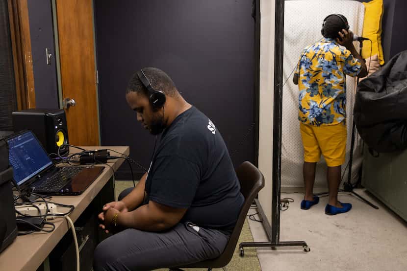 Sound engineer Kandon Phillips produces a teen's song during Big Thought’s Creative...