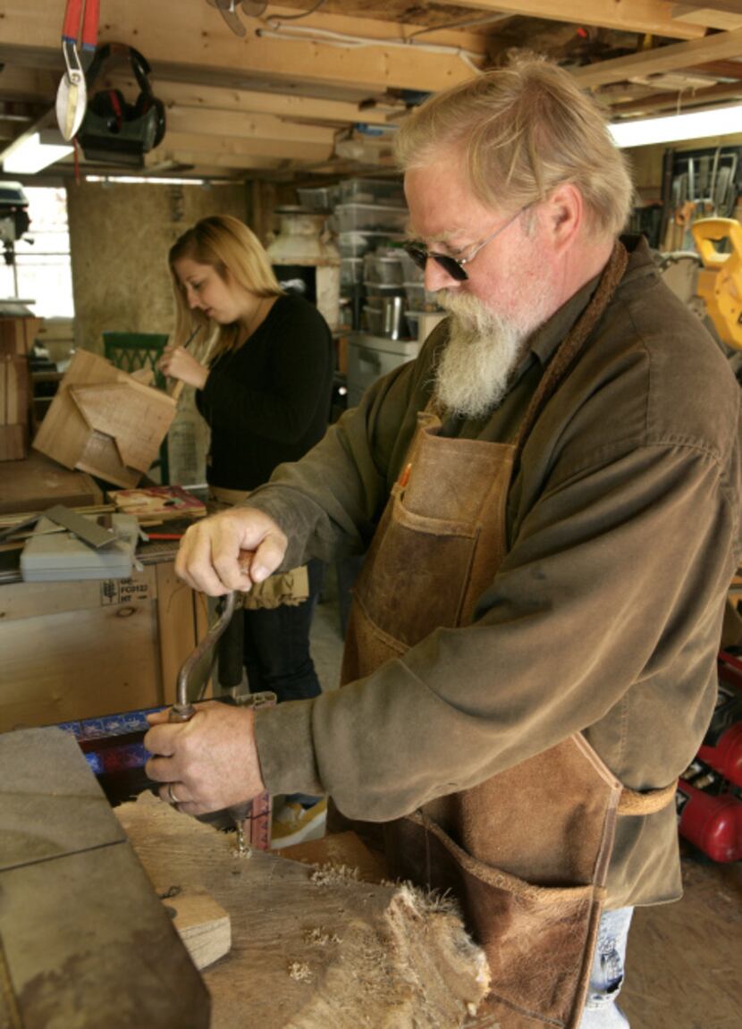 Greg White and his daughter Tracey Nelson in their Watauga workshop where they build small...