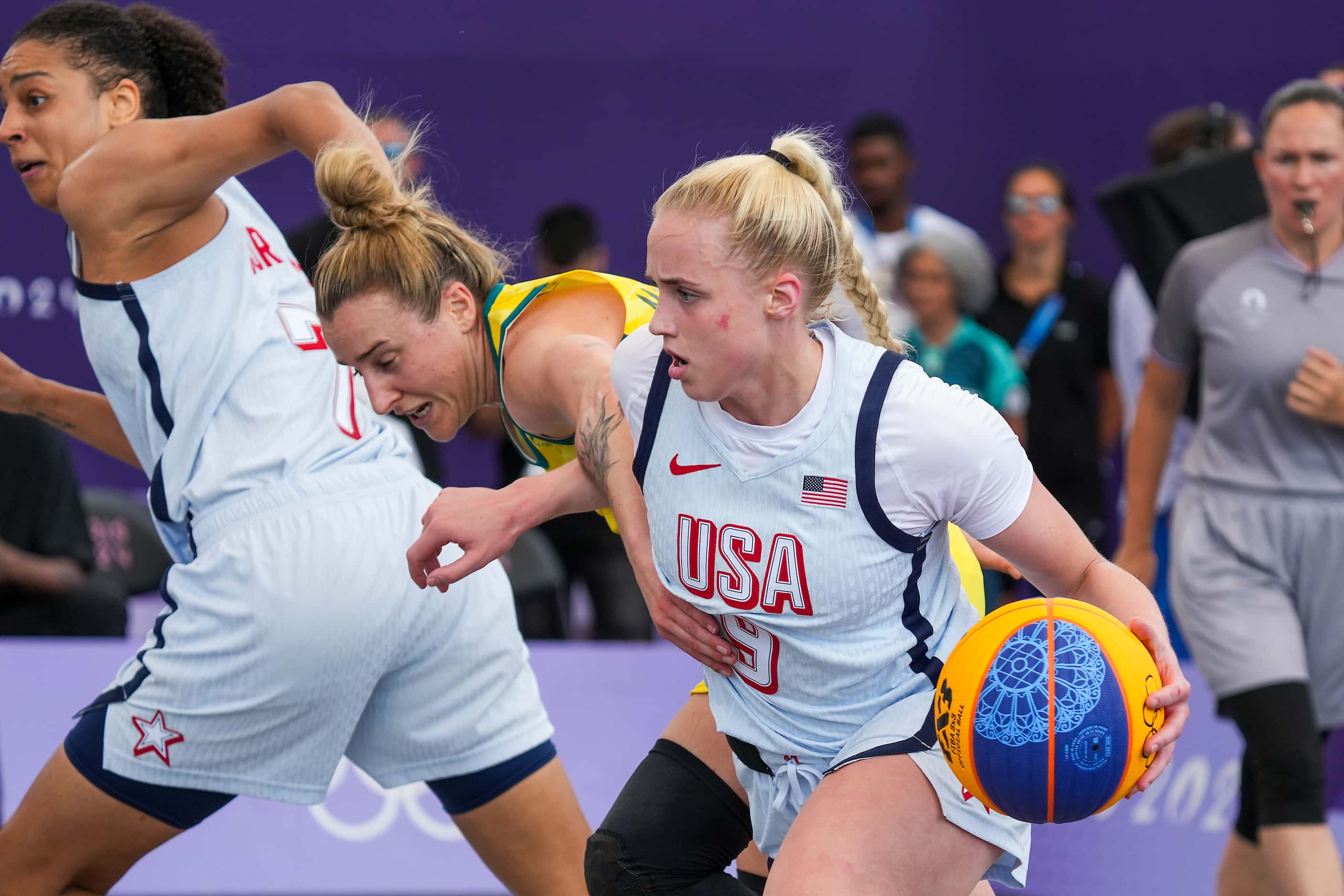 Hailey van Lith of the United States (9) drives past Lauren Mansfield of Australia during...