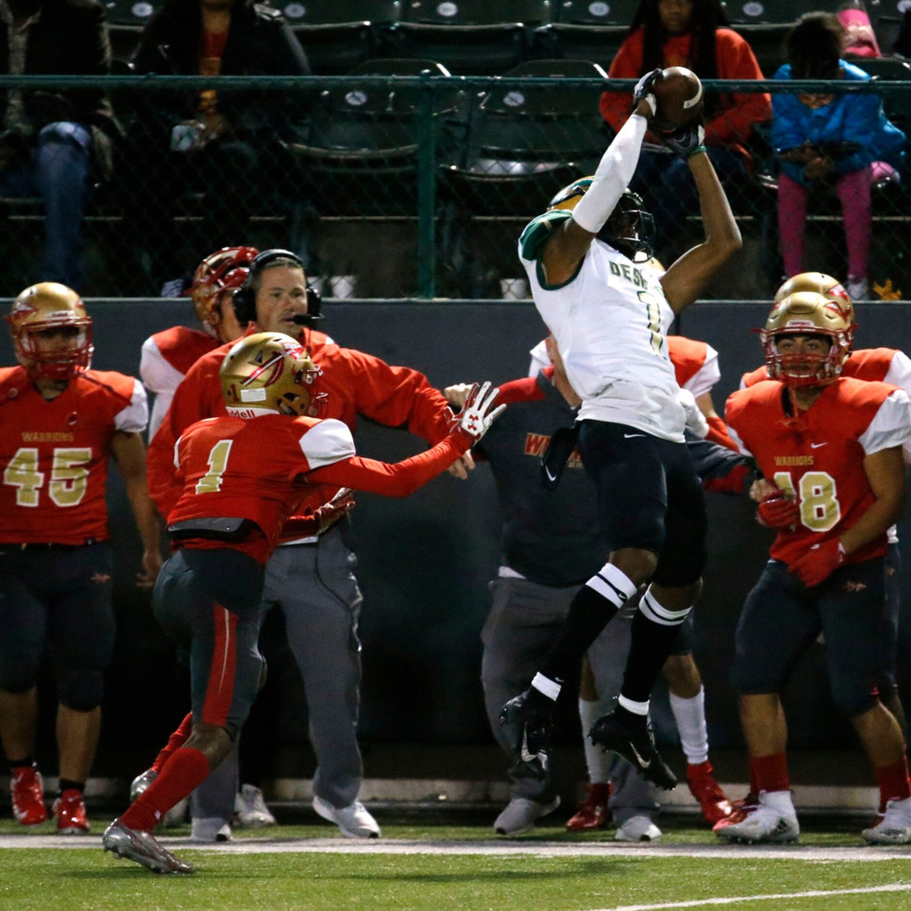 Desoto's Vontas Shenault (1) catches the ball against South Grand Prairie's Charles Walker...