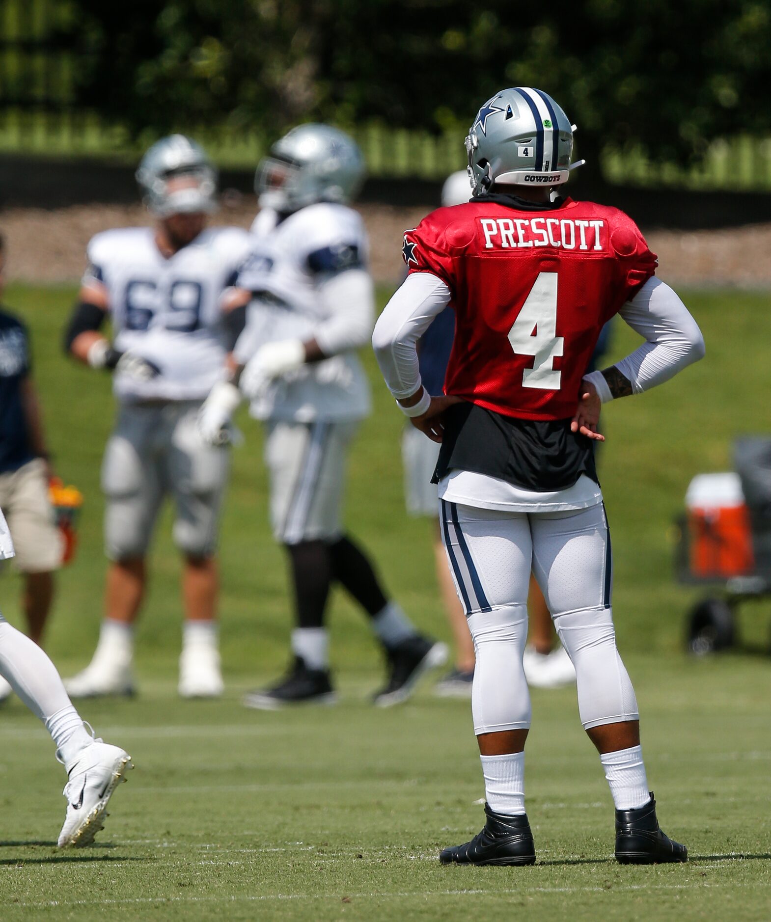 Dallas Cowboys quarterback Dak Prescott (4) looks on during practice at The Star in Frisco,...