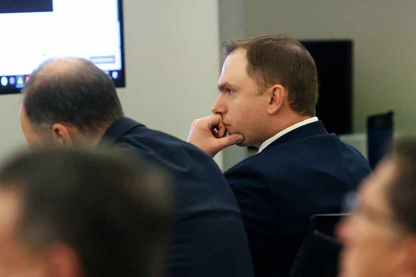 Aaron Dean listens to testimony during his trial on Monday, Dec. 12, 2022, in Fort Worth,...