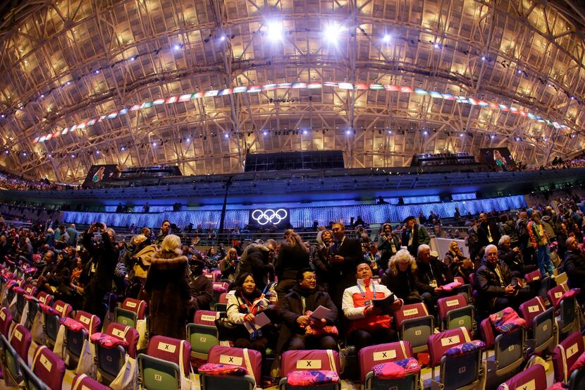 In a photo taken with a fisheye lens, spectators arrive at the Fisht Olympic Stadium prior...