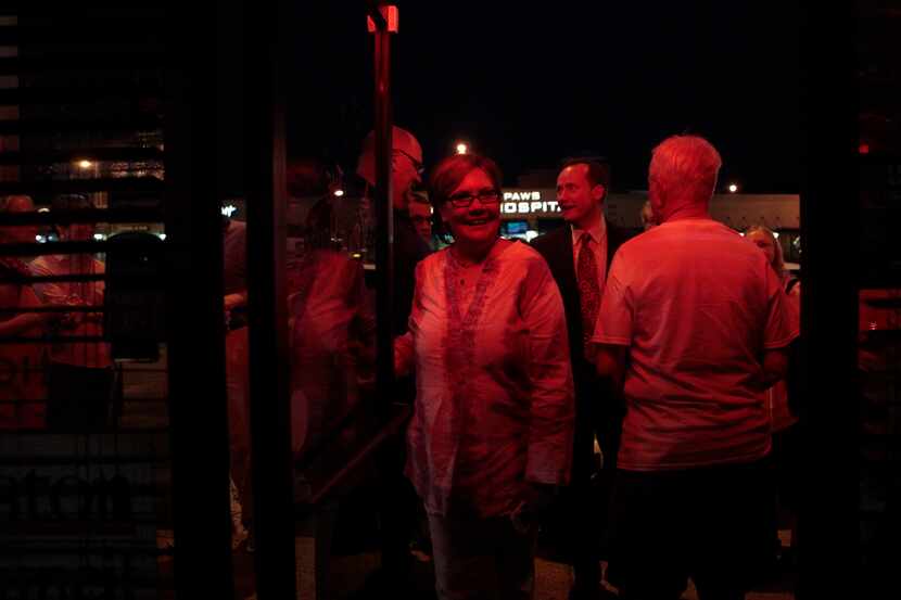 Campaign manager Anna Casey stands outside the Pour House election night watch party at the...