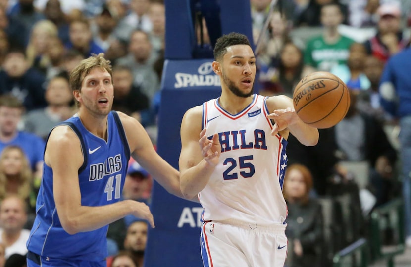 Philadelphia 76ers guard Ben Simmons (25) passes off against Dallas Mavericks forward Dirk...