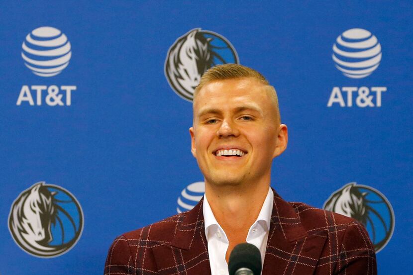 Kristaps Porzingis (6) laughs during his introductory Mavericks press conference at American...
