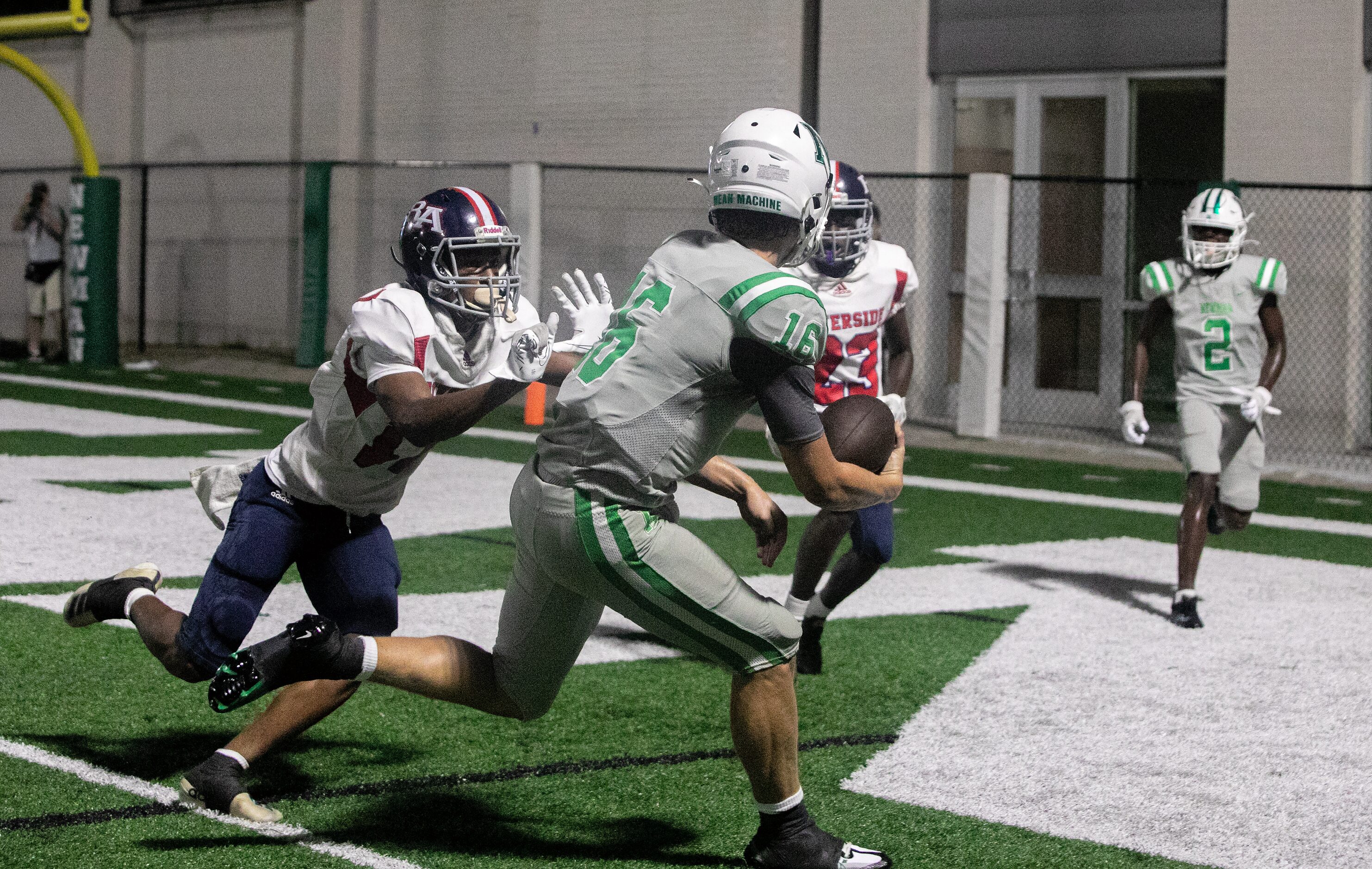 Arch Manning scrambles for the end zone during a touchdown run as Newman High School takes...