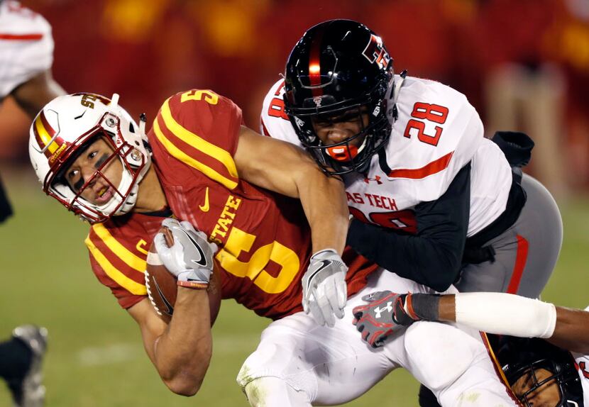 Iowa State wide receiver Allen Lazard (5) is tackled by Texas Tech defensive back Paul Banks...