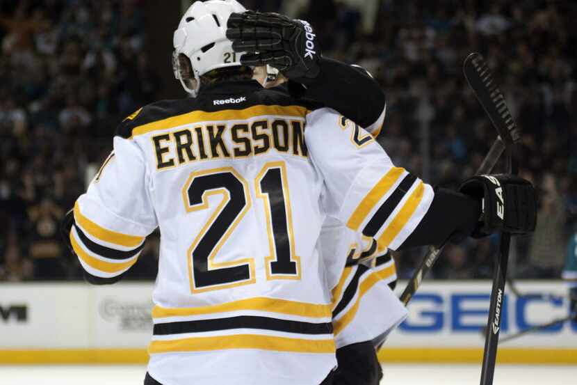 Jan 11, 2014; San Jose, CA, USA; Boston Bruins left wing Loui Eriksson (21) and center Carl...