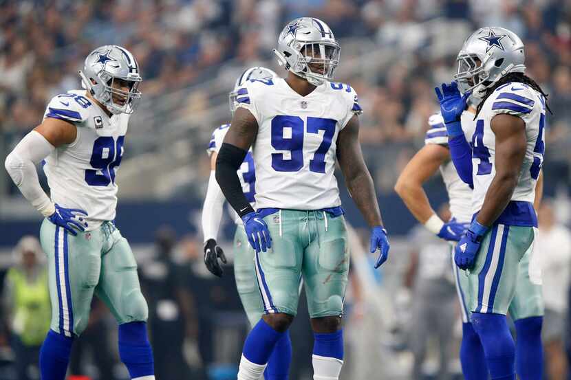 Dallas Cowboys defensive end Taco Charlton (97) is pictured between plays during the second...