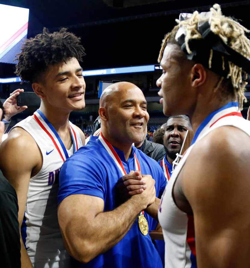 Head coach David Peavy celebrates with Duncanville's Jahmi'us Ramsey #3 as Duncanville's...