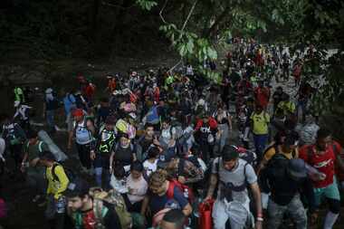 Migrants started the walk across the Darien Gap from Colombia to Panama in hopes of reaching...