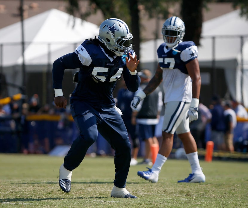 Cowboys linebacker Jaylon Smith (54) runs a drill during an afternoon practice at training...