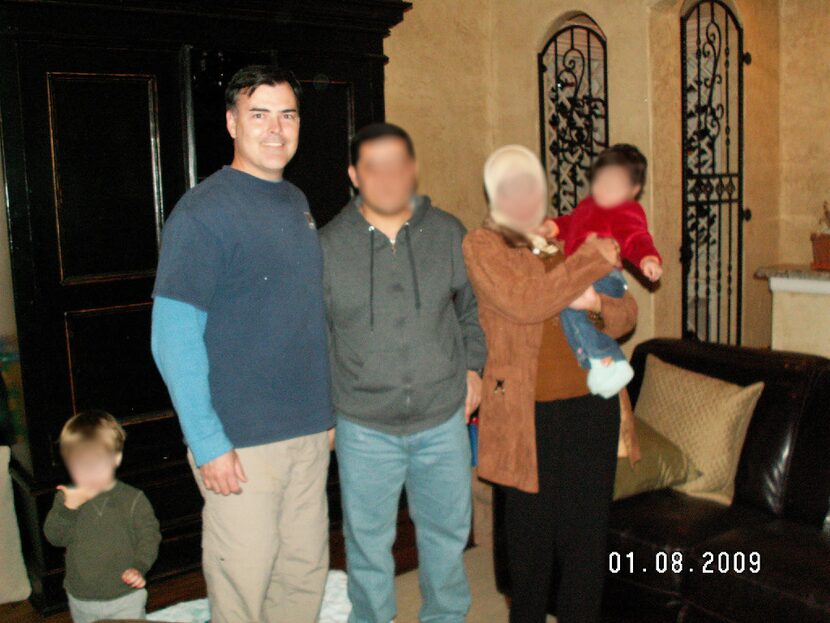 Vaught with Huthaifa, another Iraqi translator, and his family at Vaught's East Dallas home.