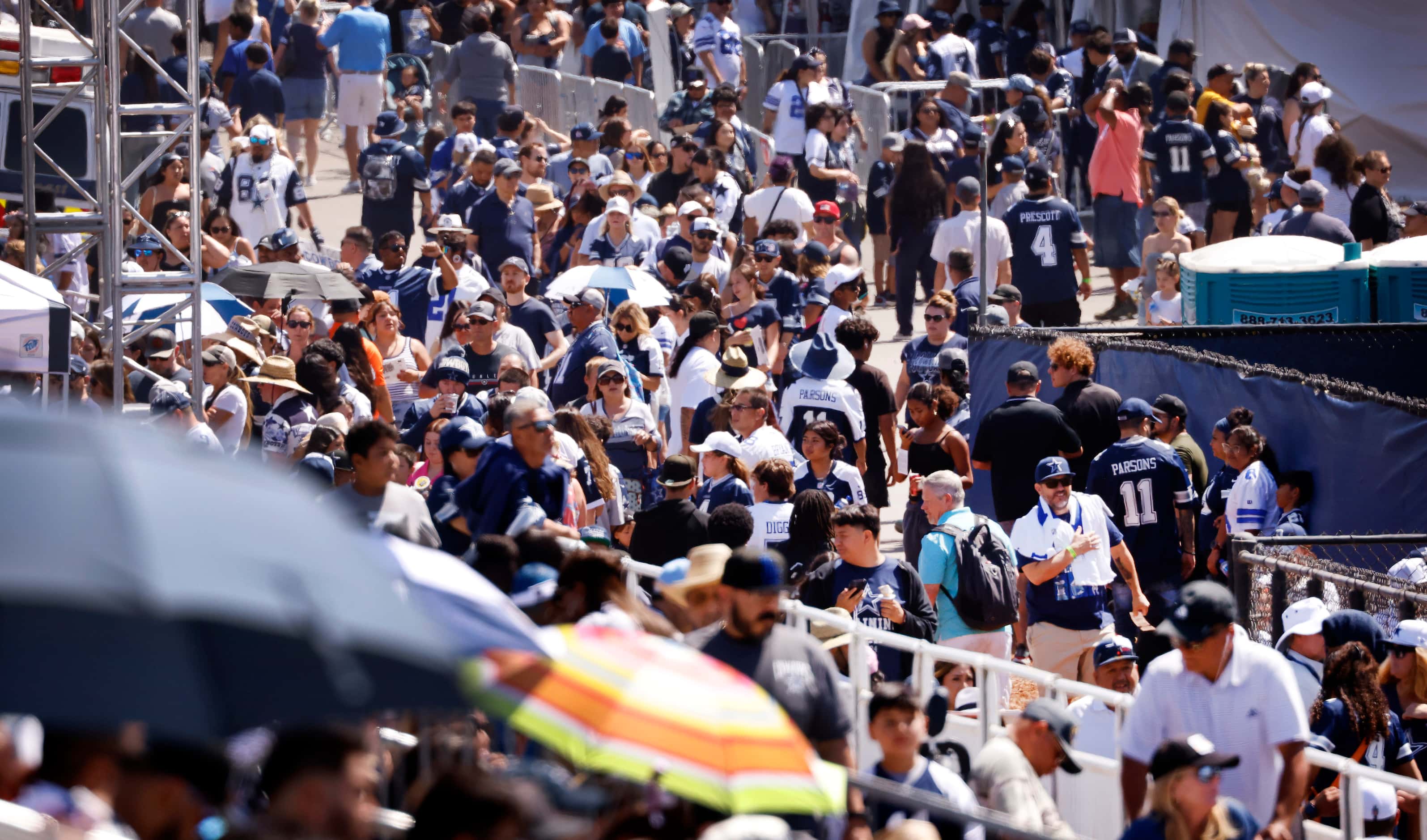 Dallas Cowboys fans arrive for a training camp practice in Oxnard, California, July 27,...