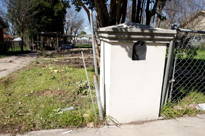 Only the mailbox and a carport remained March 13, 2019, at an empty lot where the Lemus...