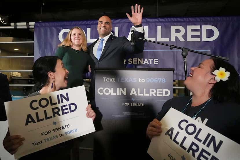 Democratic party U.S. Senate candidate Colin Allred addresses supporters alongside his wife...