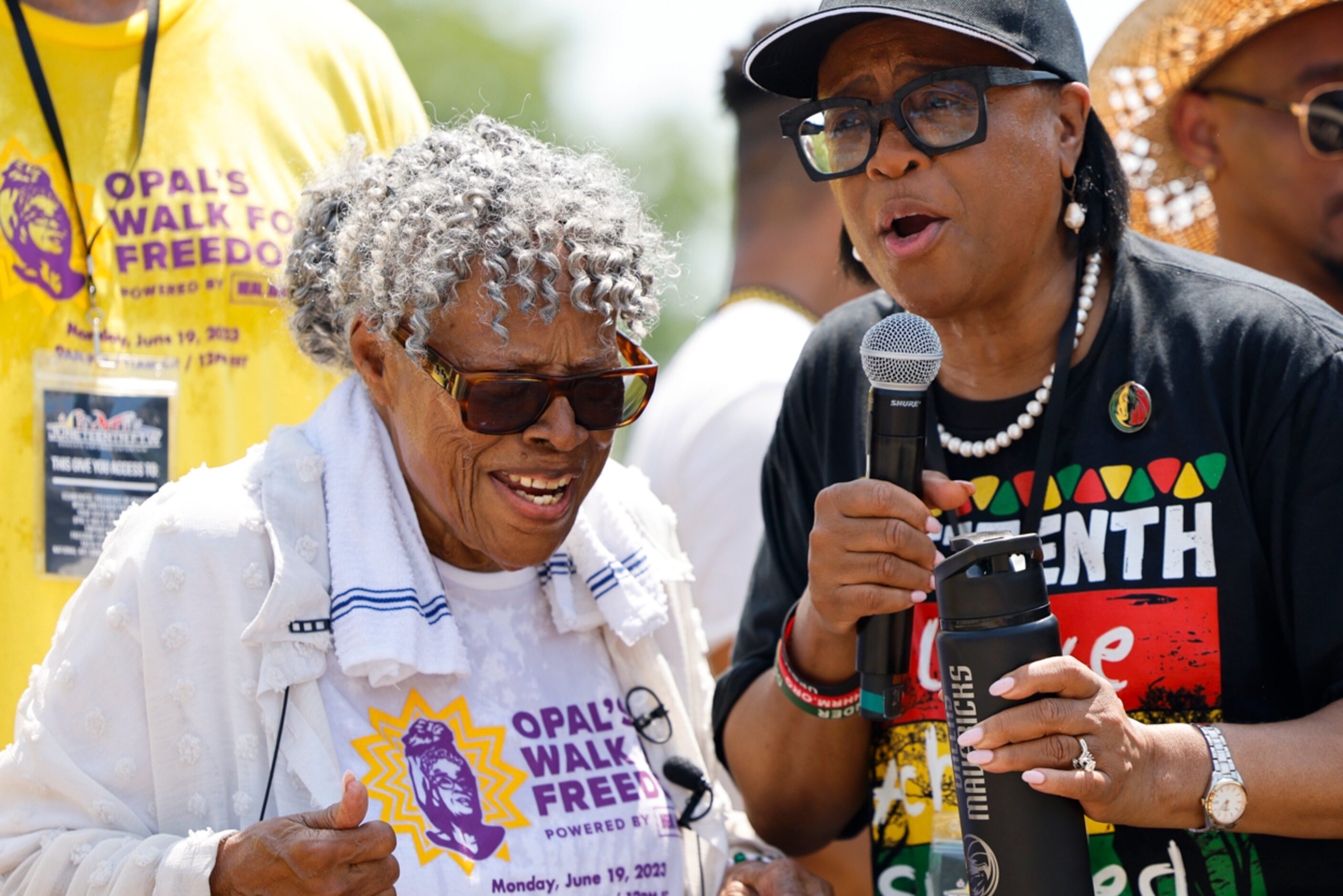 Grandmother of Juneteenth, Opal Lee (left), cheers alongside Chief Executive Officer of...