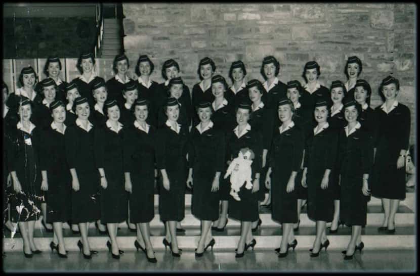 Carole DiSalvo is shown with her graduating class early in her career at American Airlines. 