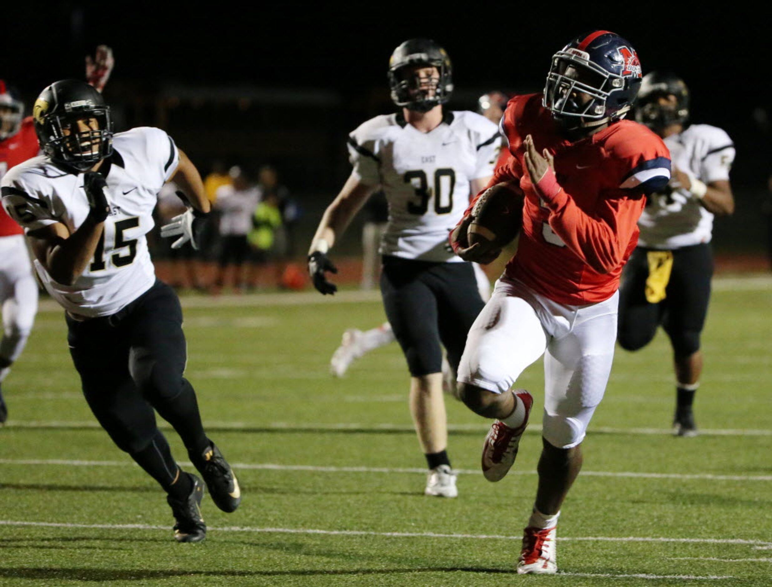 McKinney Boyd running back Stephen Driskell (3) scores a rushing touchdown to make the score...