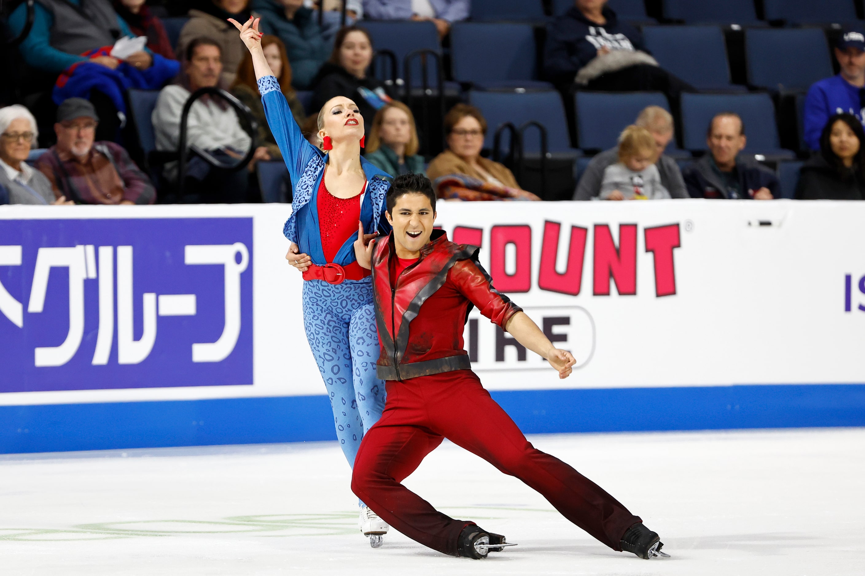 Marjorie Lajoie, left, and Zachary Lagha, right, of Canada, compete in the ice dance rhythm...