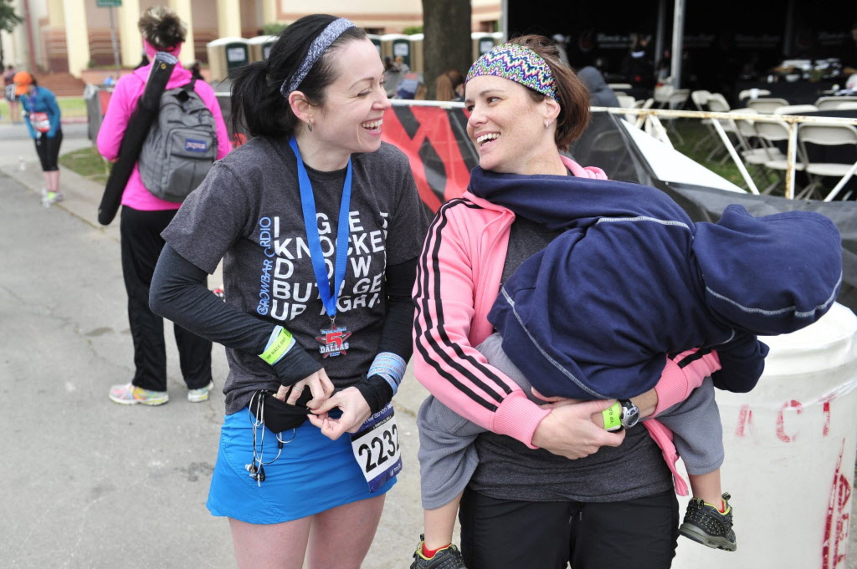 Karen Soltero (left) talks with her friend and relay partner Molly Setnick after they...