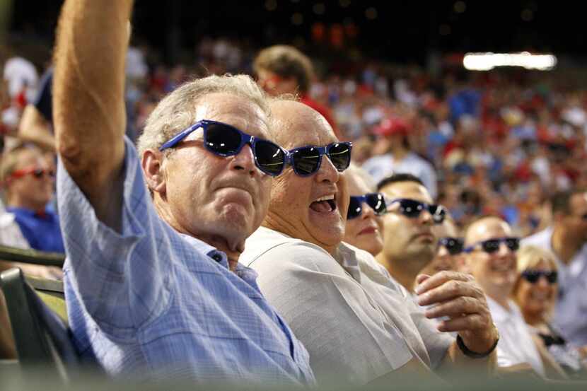 Former United States President George W. Bush (left) and Texas Rangers majority owner...