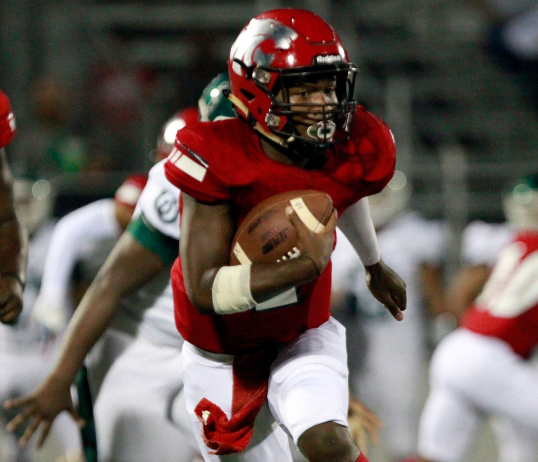 Mesquite Horn QB Davazea Gabriel (2) scrambles for a couple of yards during the first half...