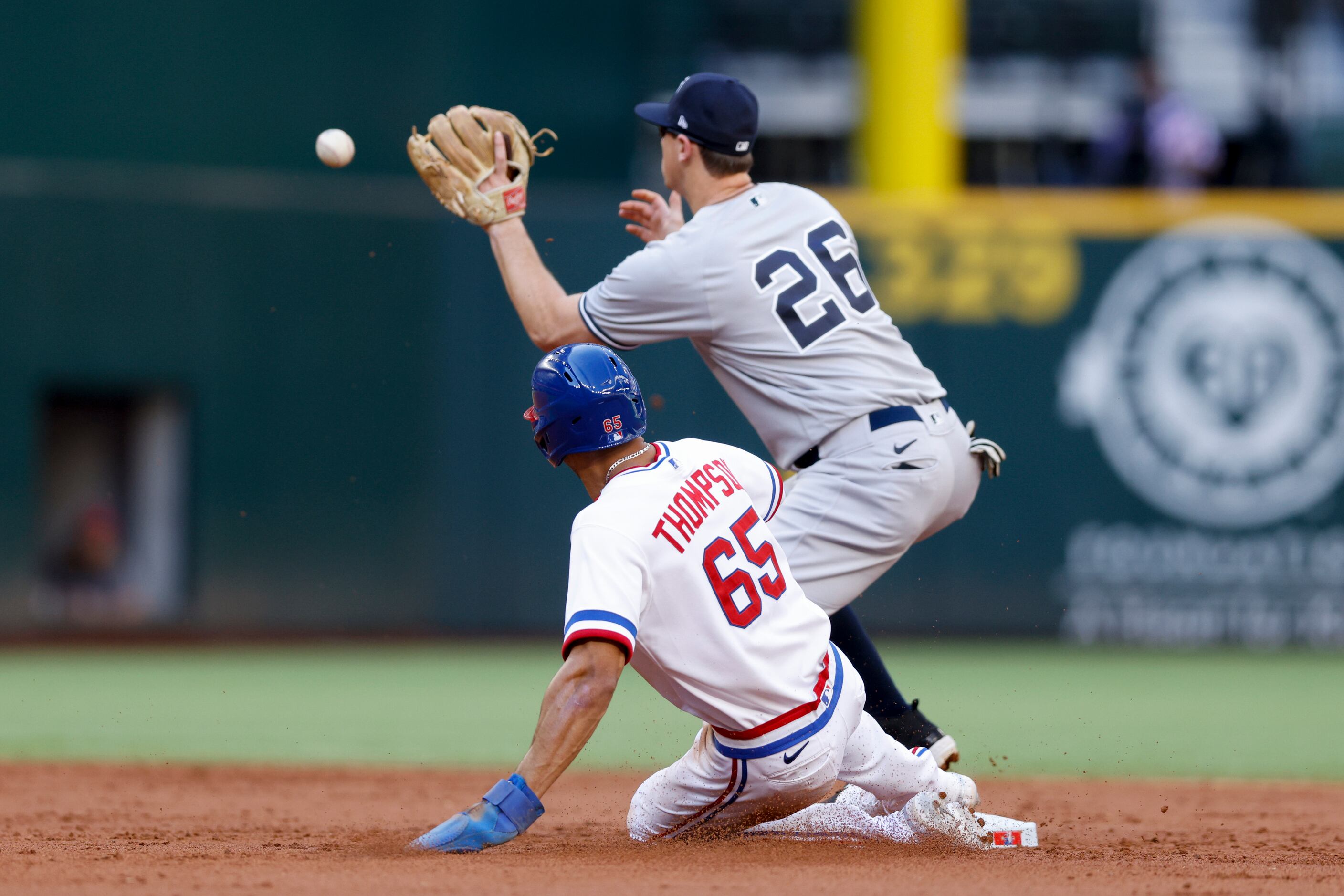 New York Yankees second baseman DJ LeMahieu (26) fields a ball to force out Texas Rangers...