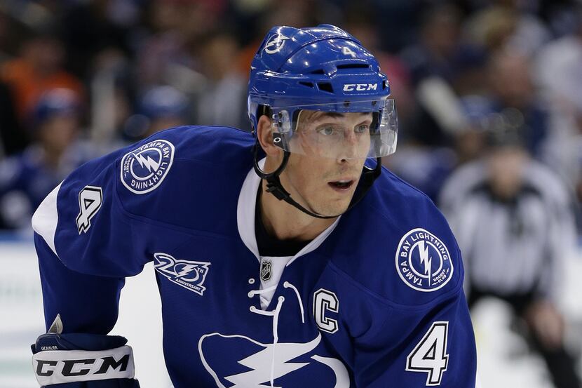 FILE - In this Jan. 27, 2013 file photo, Tampa Bay Lightning center Vincent Lecavalier looks...