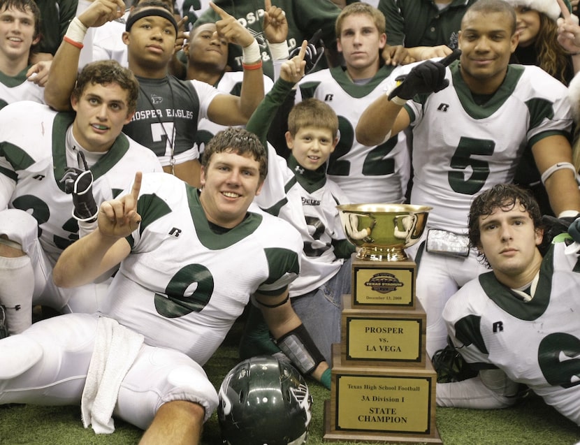 Prosper QB Hunter Nix (9), RB Bryan Monroe (5), DB Rusty Neely (6) and others celebrate...