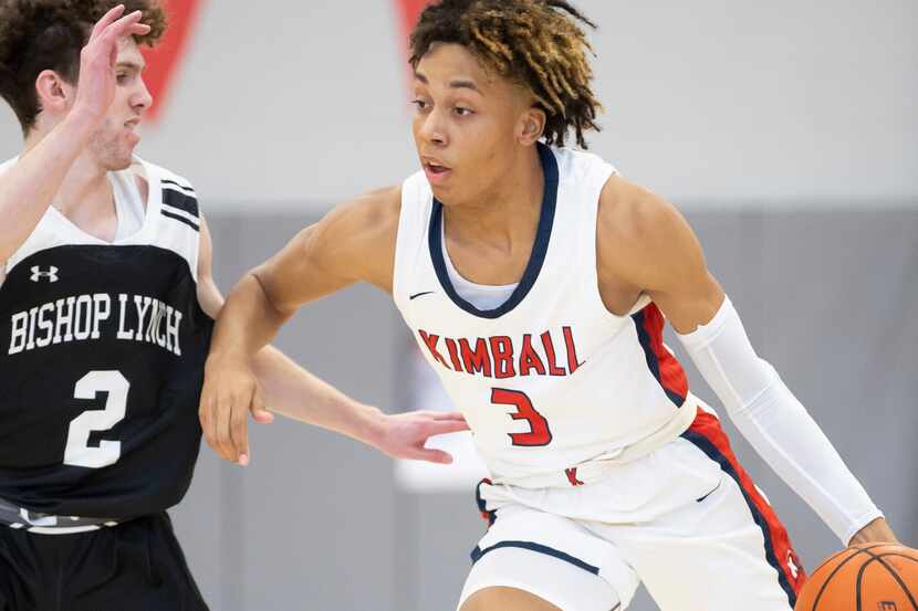 Kimball senior guard Chauncey Gibson (3) battles Bishop Lynch senior guard Braxton Teal (2)...