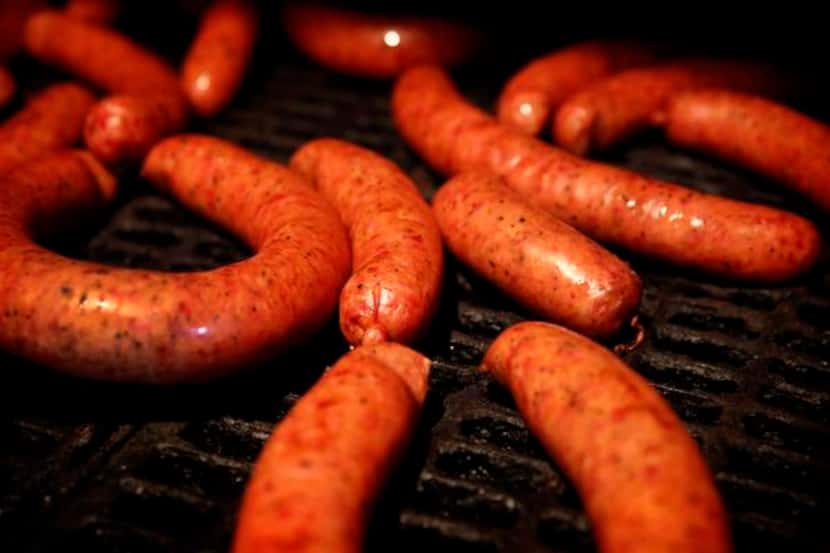 
Sausage links are smoked at Pit Stop BBQ in Waxahachie.
