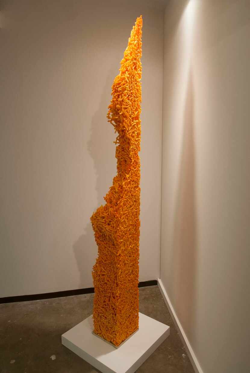 
This piece, “Aggregate 1” by artist Mike Womack, is made of Cheetos.


