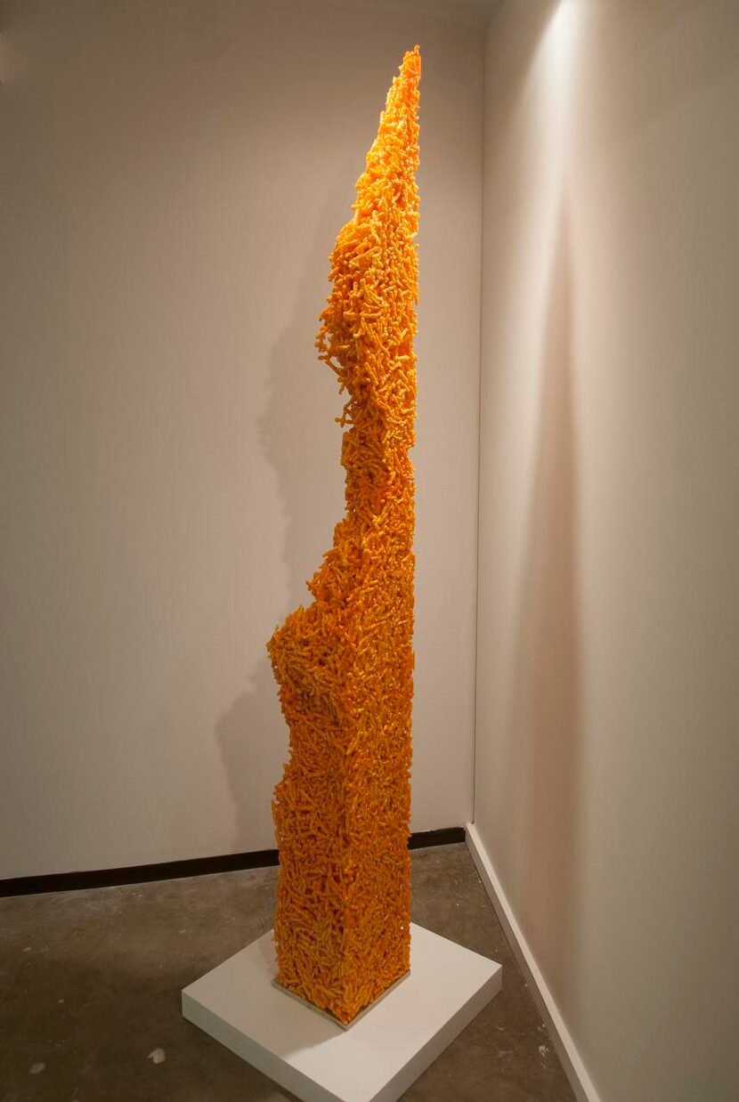 
This piece, “Aggregate 1” by artist Mike Womack, is made of Cheetos.


