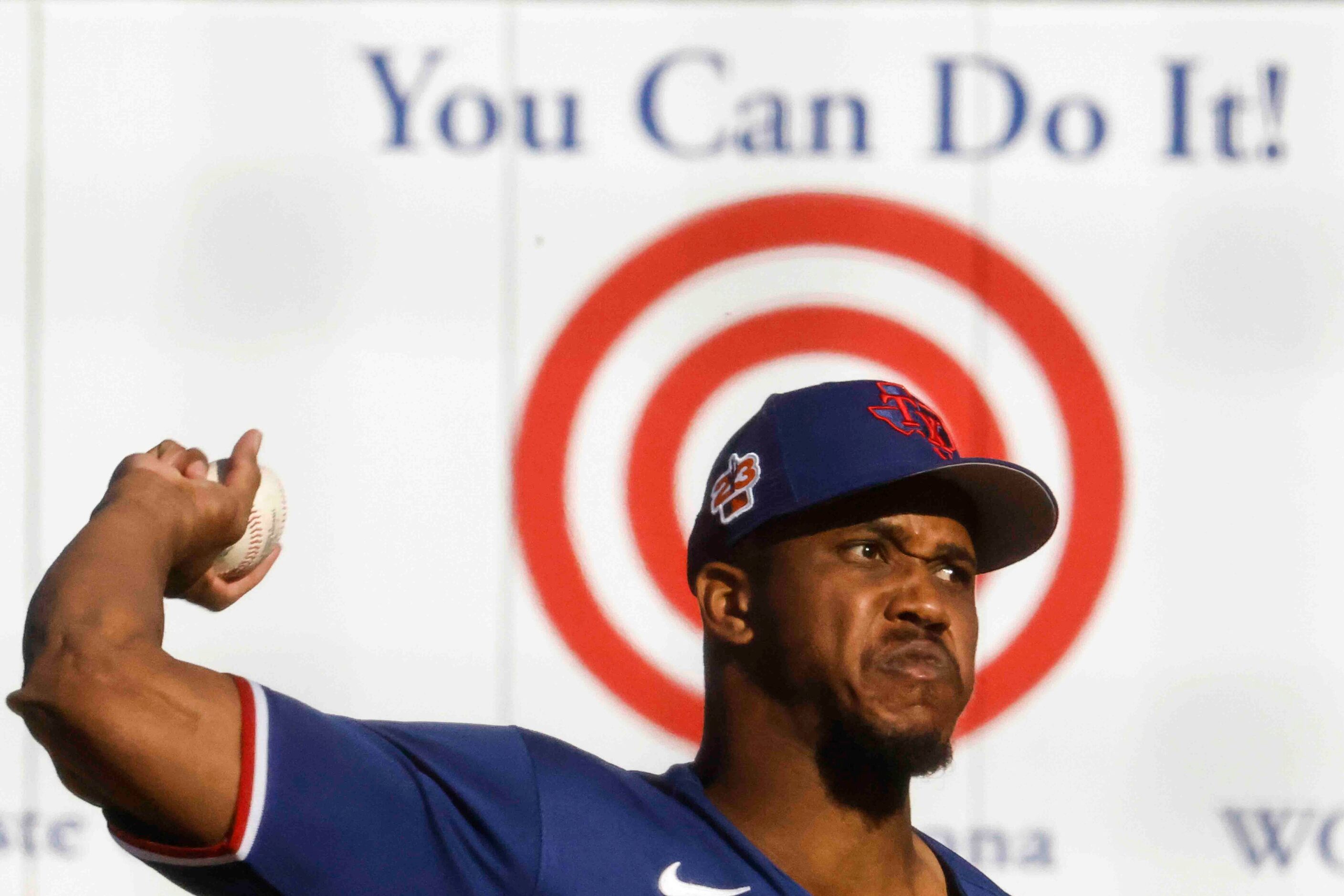 Texas Rangers Fernery Ozuna delivers a pitch during the ninth inning of a spring training...