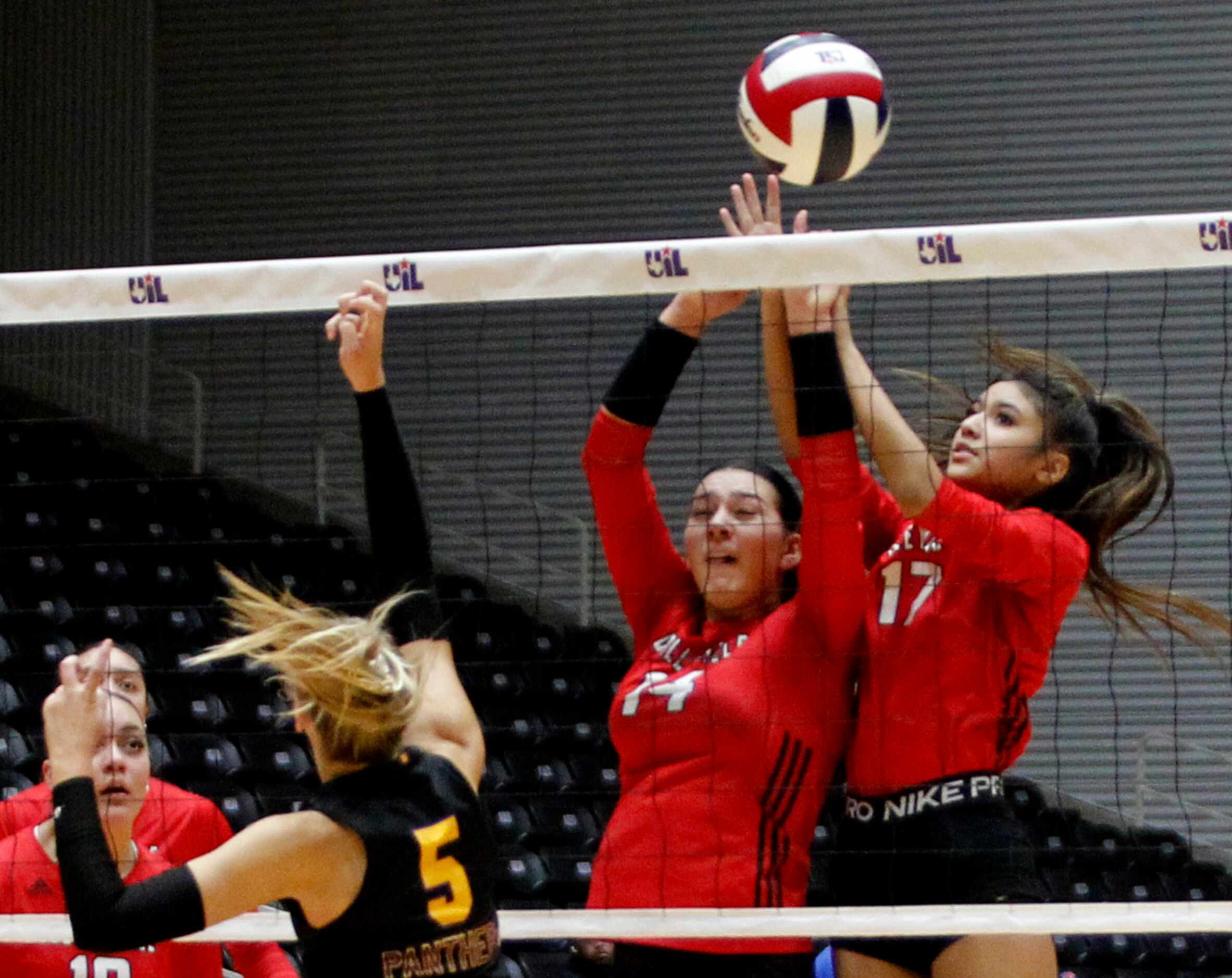 Colleyville Heritage players Lucia Cisneros (14) and Zara Mujtaba (14) collide as they...
