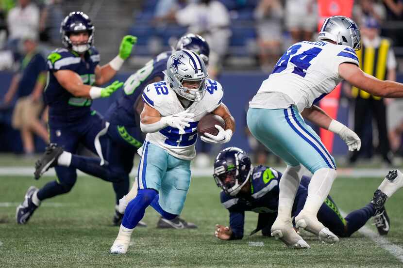 Dallas Cowboys running back Deuce Vaughn runs for a touchdown against the Seattle Seahawks...