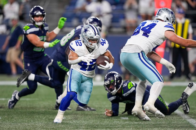 Dallas Cowboys running back Deuce Vaughn runs for a touchdown against the Seattle Seahawks...