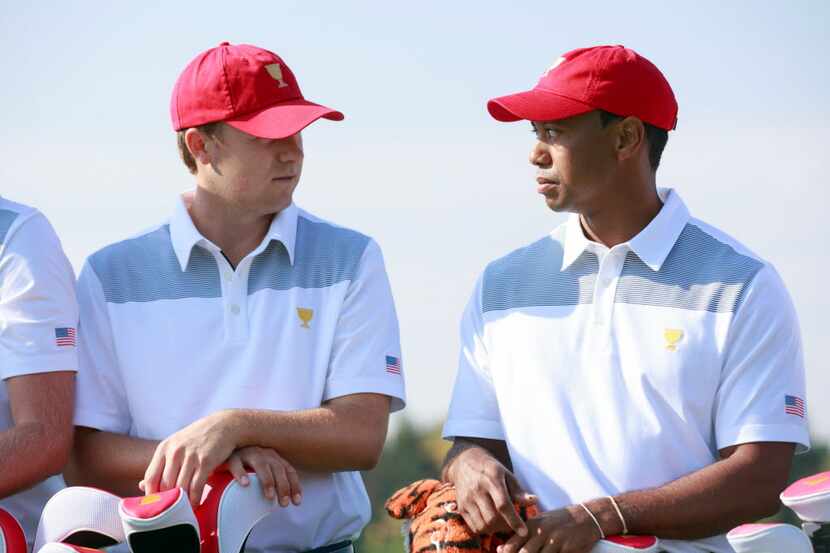 Tiger Woods (right) with Jordan Spieth (left) of the U.S. Team during a photo call on the...