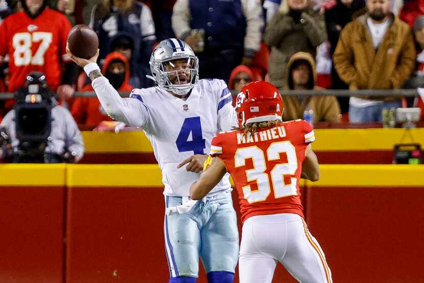 Dallas Cowboys quarterback Dak Prescott throws a pass over Kansas City Chiefs free safety...