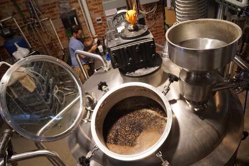 Specialty grains steep in the mash tun at the Collective Brewing Project in Fort Worth, Texas.