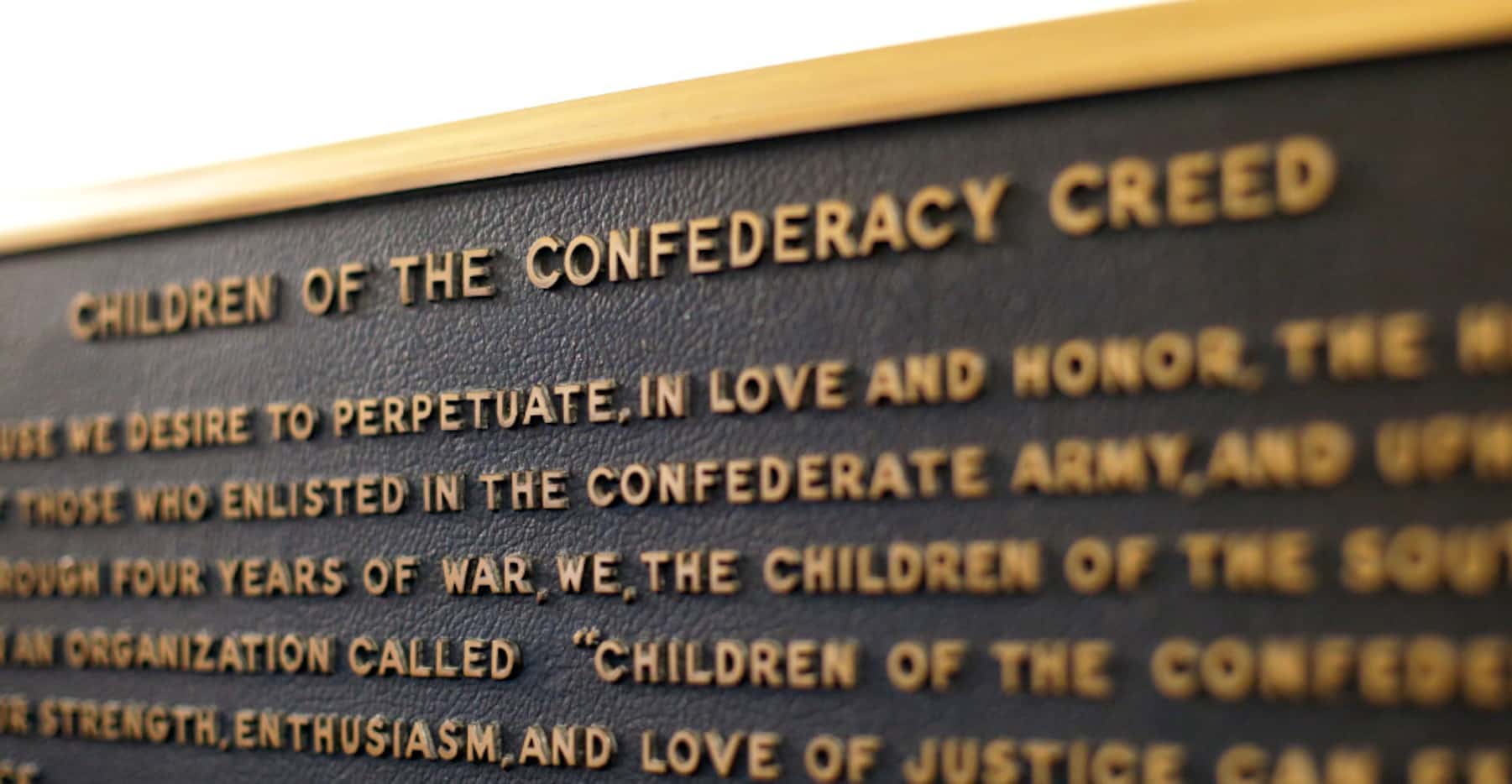 A Confederate plaque is displayed near the rotunda in the Capitol in Austin. 