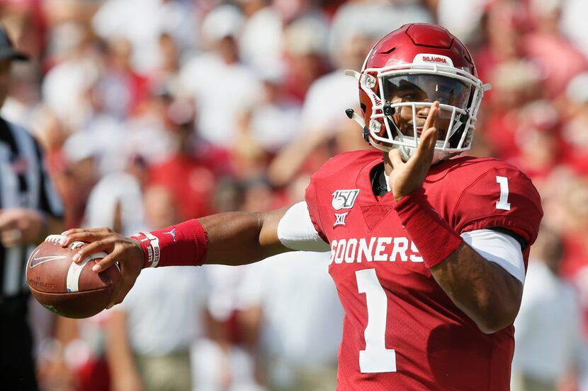 Oklahoma quarterback Jalen Hurts (1) throws in the first quarter of an NCAA college football...