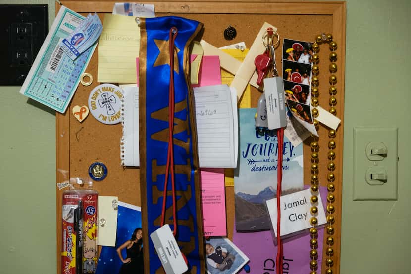 Mementos are displayed on a bulletin board in Jamal Clay s room on July 9, 2021, in Olympia...
