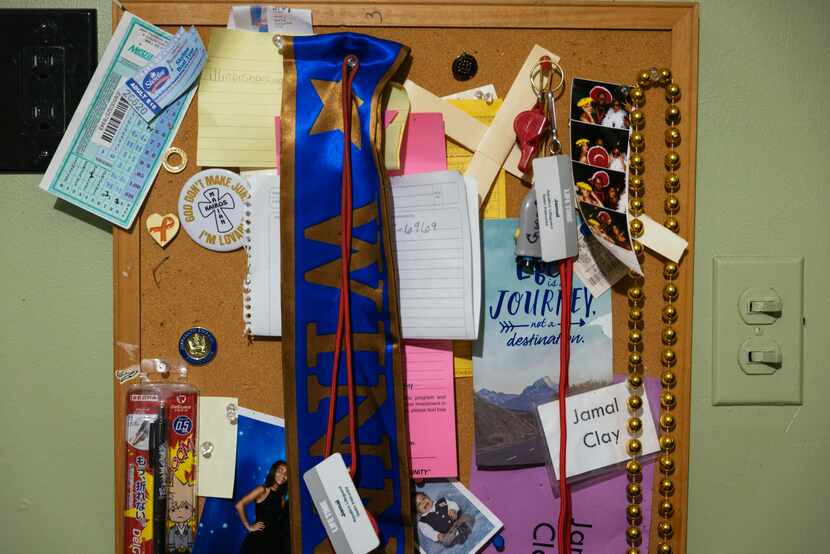 Mementos are displayed on a bulletin board in Jamal Clay s room on July 9, 2021, in Olympia...